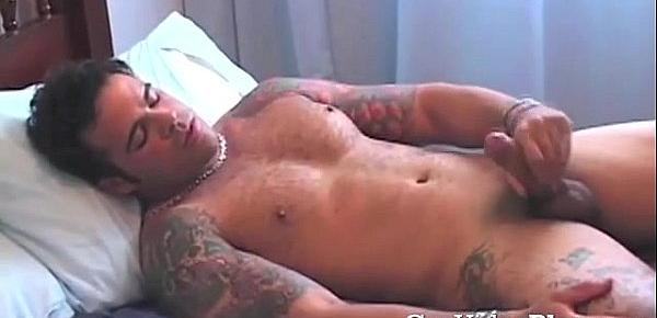  Tattooed solo stud masturbates